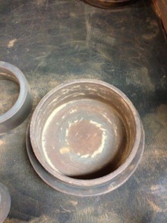 Pulveriser bowls that are either not being cleaned between samples or are in poor condition. 

